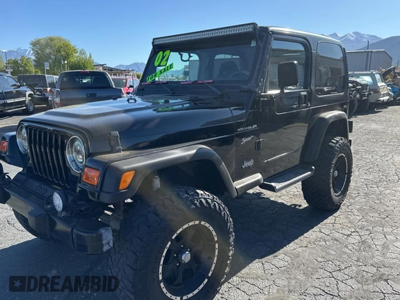 2002 Jeep Wrangler Sport with VIN 1J4FA49S32P765579, listed as a Copart auction lot 55244845 with 127,791 mi miles and Clean Title. Bid and sale history available at carsss.com. Image 2.