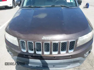 2014 Jeep Compass Sport with VIN 1C4NJCBA4ED626998, listed as a IAAI auction lot 42179793 with 109,059 mi miles. Bid and sale history available at carsss.com. Image 6.