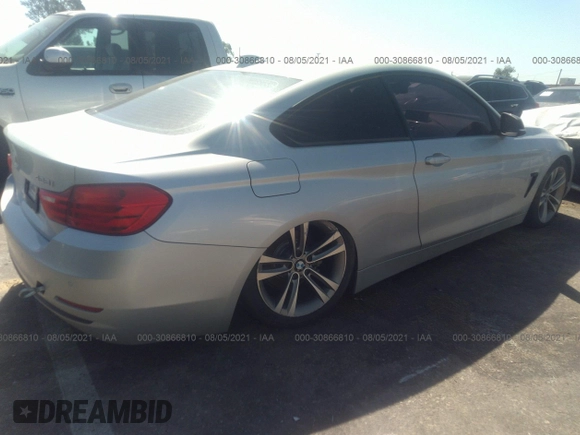 2015 BMW 4 Series 428i z VIN WBA3N7C50FK223504, wystawiony jako IAAI lot #39593317 z przebiegiem 64 668 mil mil oraz . Historia ofert i sprzedaży dostępna na DreamBid. Obrazek 4.