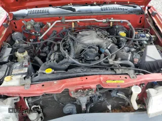 2000 Nissan Xterra XE z VIN 5N1ED28T1YC584094, wystawiony jako Copart lot #55646125 z przebiegiem 215 920 mil mil oraz Szkody całkowita. Historia ofert i sprzedaży dostępna na DreamBid. Obrazek 12.