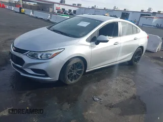 2018 Chevrolet Cruze LS with VIN 1G1BC5SM5J7182051, listed as a IAAI auction lot 41014751 with 112,749 mi miles and . Bid and sale history available at DreamBid. Image 19.