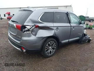 2018 Mitsubishi Outlander SE z VIN JA4AD3A35JZ064058, wystawiony jako IAAI lot #42311265 z przebiegiem 79 291 mil mil oraz . Historia ofert i sprzedaży dostępna na DreamBid. Obrazek 4.