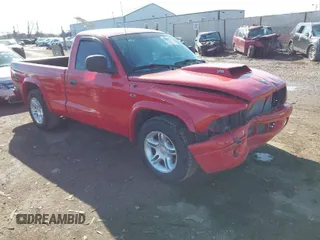 2000 Dodge Dakota SLT with VIN 1B7GL26Z6YS766872, listed as a IAAI auction lot 41854532 with 199,430 mi miles and . Bid and sale history available at DreamBid. Image 1.