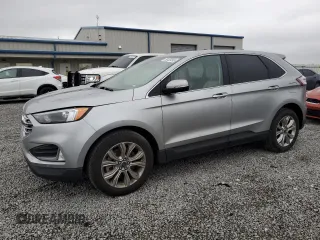 2022 Ford Edge Titanium with VIN 2FMPK4K95NBB06991, listed as a Copart auction lot 50429385 with 55,651 mi miles and Salvage title. Bid and sale history available at DreamBid. Image 1.