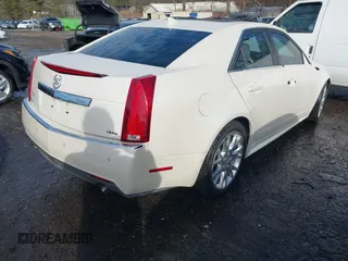 2012 Cadillac CTS Premium with VIN 1G6DP5E3XC0144157, listed as a IAAI auction lot 41311350 with 96,042 mi miles and . Bid and sale history available at DreamBid. Image 4.