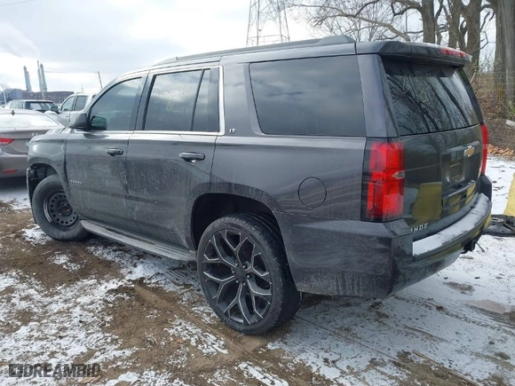 2015 Chevrolet Tahoe LT with VIN 1GNSCBKC0FR248246, listed as a IAAI auction lot 41002508 with 142,972 mi miles. Bid and sale history available at carsss.com. Image 3.