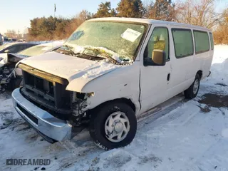 2010 Ford Econoline Wagon XL with VIN 1FBSS3BL9ADA55363, listed as a IAAI auction lot 41179750 with 127,918 mi miles. Bid and sale history available at carsss.com. Image 2.