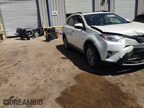 2017 Toyota RAV4 Hybrid Limited with VIN JTMDJREV5HD124597, listed as a Copart auction lot 52014275 with 32,136 mi miles and Salvage Title. Bid and sale history available at carsss.com. Image 12.