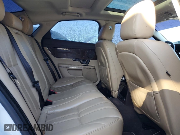 2014 Jaguar XJ with VIN SAJWA1CZ3E8V65747, listed as a Copart auction lot 81718664 with 87,846 mi miles and Clean Title. Bid and sale history available at DreamBid. Image 10.