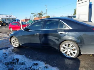 2017 Cadillac CTS Luxury AWD z VIN 1G6AX5SX7H0176310, wystawiony jako IAAI lot #41293373 z przebiegiem 161 264 mil mil oraz . Historia ofert i sprzedaży dostępna na DreamBid. Obrazek 15.