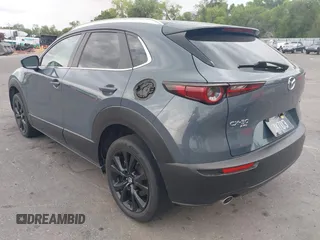 2022 Mazda CX-30 S Carbon Edition with VIN 3MVDMBCL6NM431985, listed as a IAAI auction lot 42610558 with Not provided miles and . Bid and sale history available at DreamBid. Image 3.