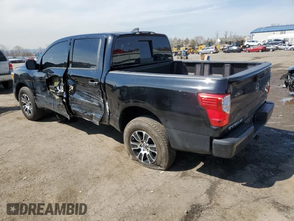2024 Nissan Titan SV with VIN 1N6AA1EC2RN101063, listed as a Copart auction lot 49879235 with 12,418 mi miles and Salvage title. Bid and sale history available at DreamBid. Image 2.