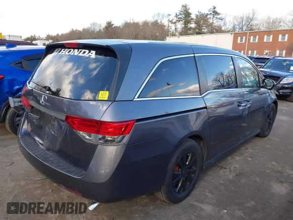2015 Honda Odyssey EX with VIN 5FNRL5H40FB049888, listed as a IAAI auction lot 41710704 with 117,696 mi miles and . Bid and sale history available at DreamBid. Image 4.