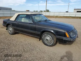 1983 Ford Mustang z VIN 1FABP2731DF221003, wystawiony jako Copart lot #72043544 z przebiegiem 20 777 mil mil oraz Szkoda całkowita • Salvage title. Historia ofert i sprzedaży dostępna na DreamBid. Obrazek 4.