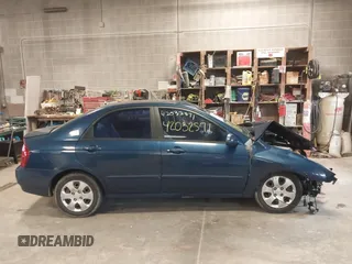 2004 Kia Spectra LX with VIN KNAFE121145012249, listed as a IAAI auction lot 42032571 with 146,748 mi miles. Bid and sale history available at carsss.com. Image 14.