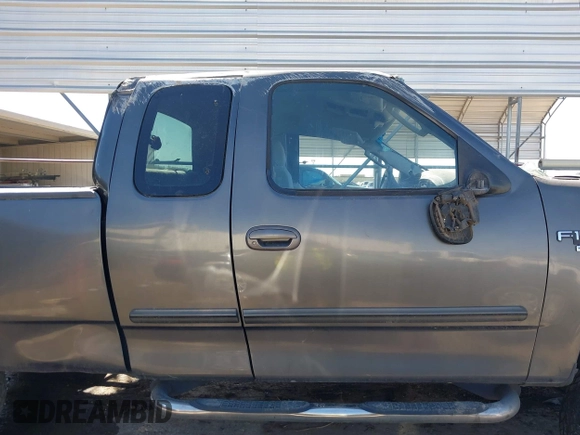 2003 Ford F-150 XL with VIN 1FTRX17L03NA40448, listed as a IAAI auction lot 41473201 with 1 mi miles. Bid and sale history available at carsss.com. Image 14.