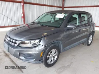 2012 Volkswagen Tiguan SEL with VIN WVGAV7AX1CW004744, listed as a IAAI auction lot 41924952 with 100,964 mi miles and . Bid and sale history available at DreamBid. Image 2.