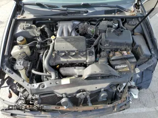 2002 Toyota Camry XLE z VIN 4T1BF32K02U034535, wystawiony jako Copart lot #53894995 z przebiegiem 253 037 mil mil oraz Szkoda całkowita • Salvage title. Historia ofert i sprzedaży dostępna na DreamBid. Obrazek 11.