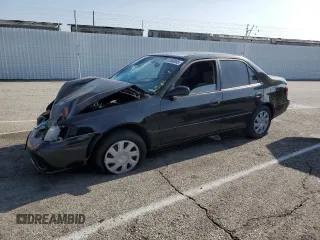 2002 Toyota Corolla CE with VIN 1NXBR12EX2Z586078, listed as a Copart auction lot 61500045 with Not provided miles and Salvage title. Bid and sale history available at DreamBid. Image 1.
