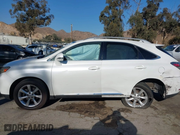 2011 Lexus RX 350 with VIN JTJZK1BAXB2005451, listed as a IAAI auction lot 41218592 with 185,801 mi miles. Bid and sale history available at carsss.com. Image 14.