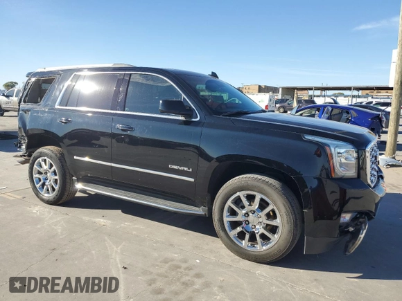2019 GMC Yukon Denali with VIN 1GKS2CKJ9KR186604, listed as a Copart auction lot 82201124 with 110,069 mi miles and Salvage Title. Bid and sale history available at DreamBid. Image 4.
