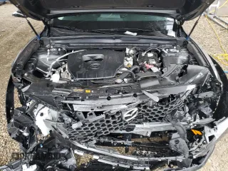 2025 Mazda CX-50 S Preferred with VIN 7MMVABBM2SN308582, listed as a Copart auction lot 51521435 with 16,914 mi miles and Salvage Title. Bid and sale history available at carsss.com. Image 12.