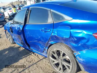 2018 Honda Civic Si with VIN 2HGFC1E56JH700325, listed as a IAAI auction lot 42007770 with 101,386 mi miles and . Bid and sale history available at DreamBid. Image 6.