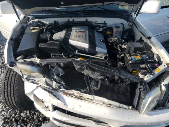 2006 Lexus LX 470 z VIN JTJHT00W864007291, wystawiony jako Copart lot #57331555 z przebiegiem 142 194 mil mil oraz Szkoda całkowita • Salvage title. Historia ofert i sprzedaży dostępna na DreamBid. Obrazek 12.