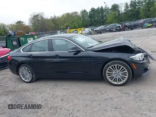 2016 BMW 4 Series 428i xDrive z VIN WBA4C9C51GG139038, wystawiony jako IAAI lot #42247629 z przebiegiem 48 388 mil mil oraz . Historia ofert i sprzedaży dostępna na DreamBid. Obrazek 13.