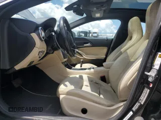 2015 Mercedes-Benz CLA 250 with VIN WDDSJ4GB8FN182830, listed as a Copart auction lot 63206895 with 220,061 mi miles and Salvage title. Bid and sale history available at DreamBid. Image 7.