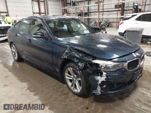 2014 BMW 3 Series 328i Gran Turismo xDrive with VIN WBA3X5C5XED557668, listed as a IAAI auction lot 41728522 with 123,393 mi miles and . Bid and sale history available at DreamBid. Image 1.