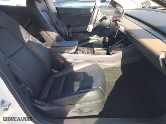 2018 Tesla Model 3 Long Range Battery with VIN 5YJ3E1EA0JF008351, listed as a IAAI auction lot 41129459 with 36,518 mi miles. Bid and sale history available at carsss.com. Image 5.