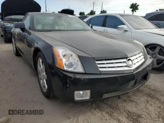 2005 Cadillac XLR z VIN 1G6YV34A955600425, wystawiony jako Copart lot #76188034 z przebiegiem Nie podano mil oraz Szkody całkowita. Historia ofert i sprzedaży dostępna na DreamBid. Obrazek 4.