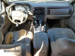 2004 Jeep Grand Cherokee Limited with VIN 1J4GW58S24C374012, listed as a Copart auction lot 44896325 with 153,978 mi miles and Salvage title. Bid and sale history available at DreamBid. Image 8.