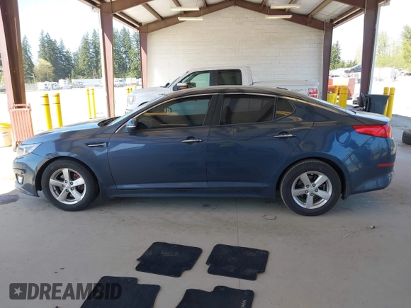 2015 Kia Optima LX with VIN KNAGM4A70F5592109, listed as a IAAI auction lot 42053533 with 159,401 mi miles. Bid and sale history available at carsss.com. Image 14.