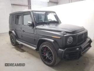 2022 Mercedes-Benz G 63 AMG with VIN W1NYC7HJ2NX444083, listed as a Copart auction lot 64764324 with 7,909 mi miles and Salvage title. Bid and sale history available at DreamBid. Image 4.