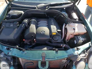 1999 Mercedes-Benz CLK-Class with VIN WDBLJ65G4XF071095, listed as a Copart auction lot 72080064 with 97,558 mi miles and Salvage Title. Bid and sale history available at carsss.com. Image 11.