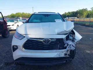 2023 Toyota Highlander L with VIN 5TDKDRAH5PS005966, listed as a IAAI auction lot 41976292 with 51,857 mi miles and . Bid and sale history available at DreamBid. Image 12.