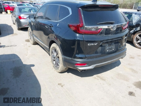 2021 Honda CR-V Touring with VIN 5J6RW2H94ML013546, listed as a IAAI auction lot 42058560 with 22,454 mi miles. Bid and sale history available at carsss.com. Image 3.