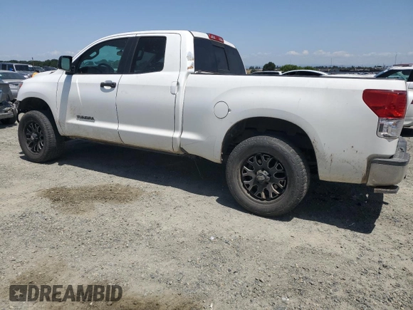 2012 Toyota Tundra with VIN 5TFRM5F14CX039145, listed as a Copart auction lot 56520015 with 129,114 mi miles and Salvage title. Bid and sale history available at DreamBid. Image 2.