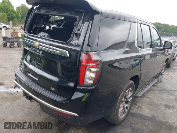 2023 Chevrolet Tahoe LT with VIN 1GNSKNKD8PR105849, listed as a IAAI auction lot 42308786 with 51,748 mi miles and . Bid and sale history available at DreamBid. Image 4.