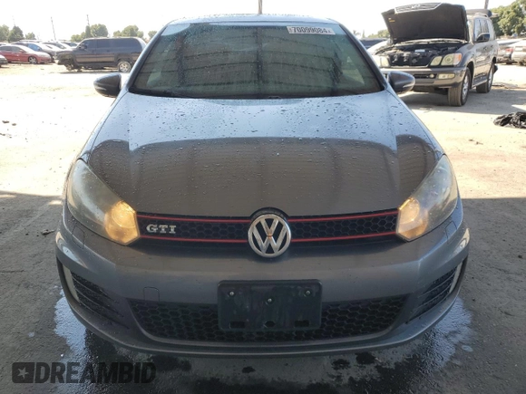 2013 Volkswagen GTI w/Conv & Sunroof z VIN WVWFD7AJ4DW031740, wystawiony jako Copart lot #70099084 z przebiegiem 130 193 mil mil oraz Szkoda całkowita • Salvage title. Historia ofert i sprzedaży dostępna na DreamBid. Obrazek 5.