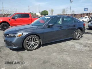 2024 Honda Civic Sedan Touring with VIN 2HGFE1F91RH303600, listed as a Copart auction lot 50323155 with 18,396 mi miles and Salvage Title. Bid and sale history available at carsss.com. Image 1.