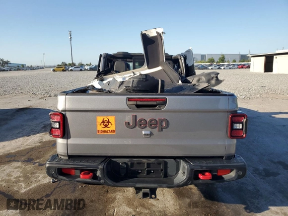 2020 Jeep Gladiator Rubicon with VIN 1C6JJTBG7LL112446, listed as a Copart auction lot 53548815 with 73,374 mi miles and Non Repairable. Bid and sale history available at DreamBid. Image 6.