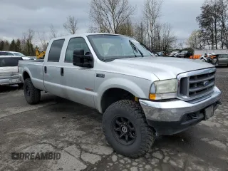 2004 Ford F-350 XL with VIN 1FTSW31P94EA54393, listed as a Copart auction lot 48525235 with Not Provided miles and Salvage Title. Bid and sale history available at DreamBid. Image 4.
