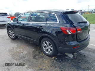 2014 Mazda CX-9 Touring with VIN JM3TB2CA9E0442202, listed as a IAAI auction lot 42292356 with 239,578 mi miles and . Bid and sale history available at DreamBid. Image 3.