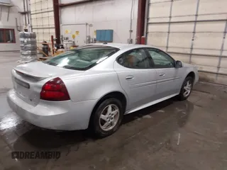 2004 Pontiac Grand Prix GT2 z VIN 2G2WS522641126247, wystawiony jako IAAI lot #42338014 z przebiegiem 236 735 mil mil oraz . Historia ofert i sprzedaży dostępna na DreamBid. Obrazek 4.