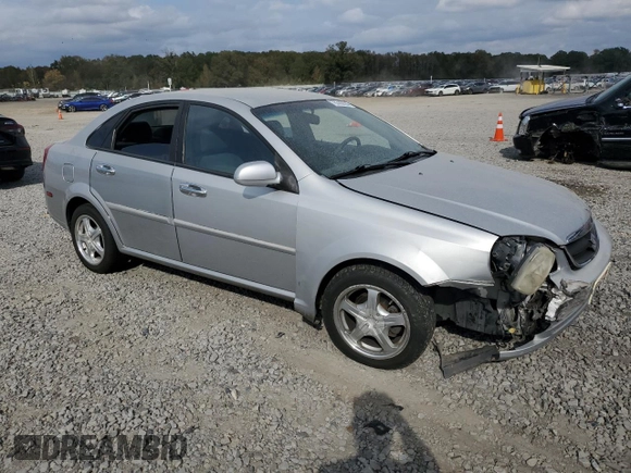 2006 Suzuki Forenza z VIN KL5JD56Z96K362651, wystawiony jako Copart lot #78306894 z przebiegiem 167 916 mil mil oraz Tytuł czysty. Historia ofert i sprzedaży dostępna na DreamBid. Obrazek 4.