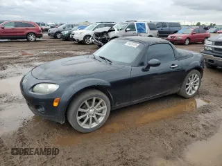 2008 Mazda MX-5 Miata Grand Touring z VIN JM1NC26F680154616, wystawiony jako Copart lot #59626755 z przebiegiem 148 051 mil mil oraz Szkoda całkowita • Salvage title. Historia ofert i sprzedaży dostępna na DreamBid. Obrazek 1.