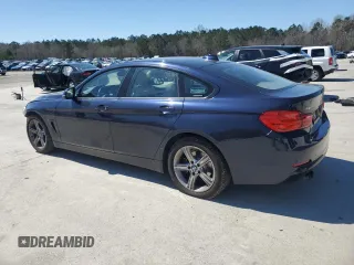 2015 BMW 4 Series 428i with VIN WBA4A5C53FGK15503, listed as a Copart auction lot 49297895 with 125,055 mi miles and Salvage title. Bid and sale history available at DreamBid. Image 2.